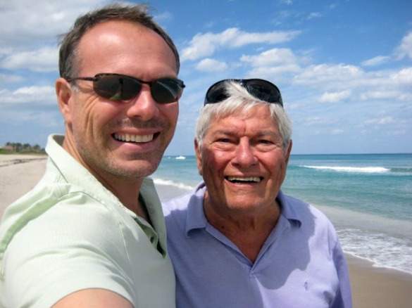 Taking a daily walk on the beach with his dad in Florida