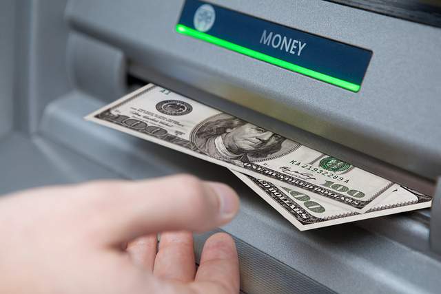 How do you use an ATM?