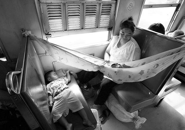 woman baby train thailand